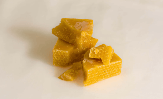 A detail photo of organic beeswax, used in Yay for Earth's Sensitive Skin Face Lotion.