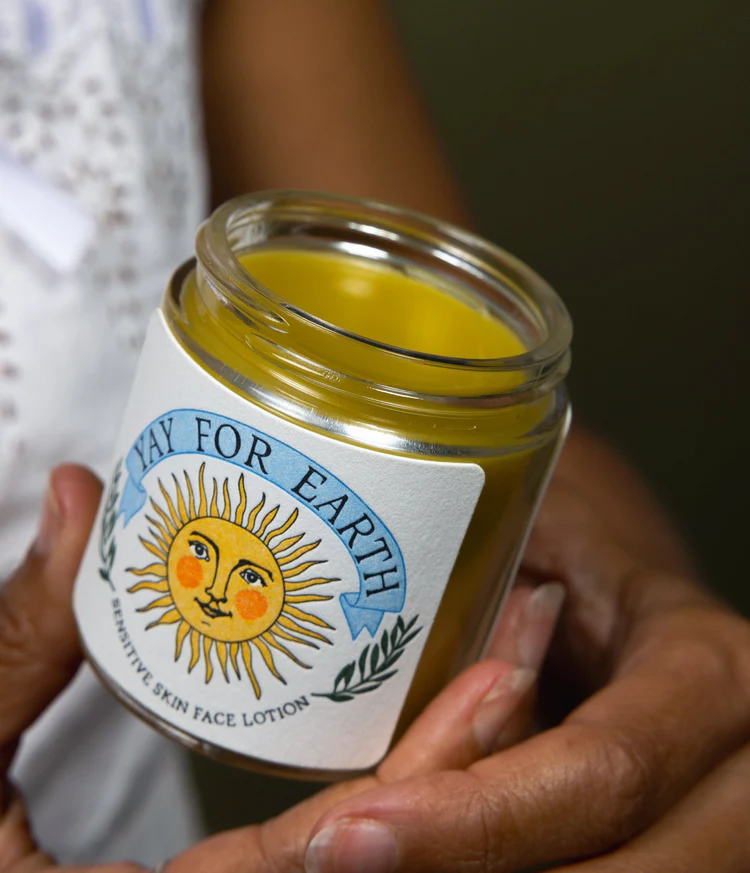 A detail photo of Yay for Earth's natural face moisturizer. Crafted for all skin types, this gentle formula delivers deep hydration with nutrient-rich, all organic ingredients. 